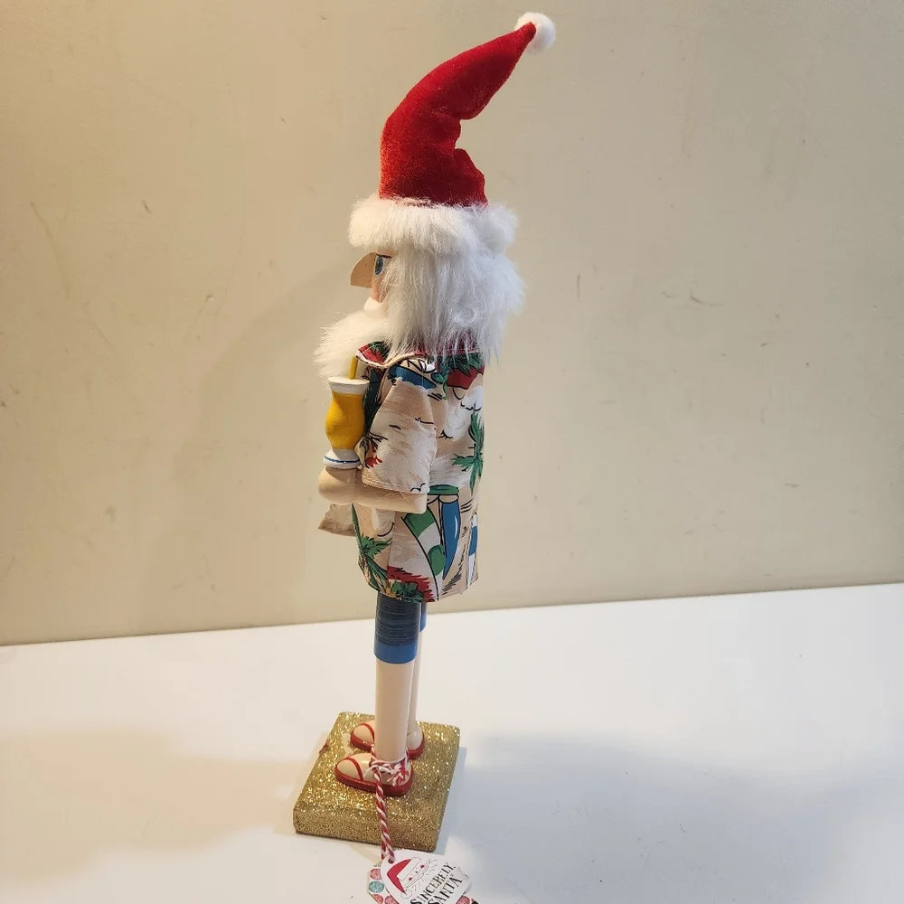 Wooden nutcracker styled as a Beachy  Santa Claus W/floral shirt, sunglasses